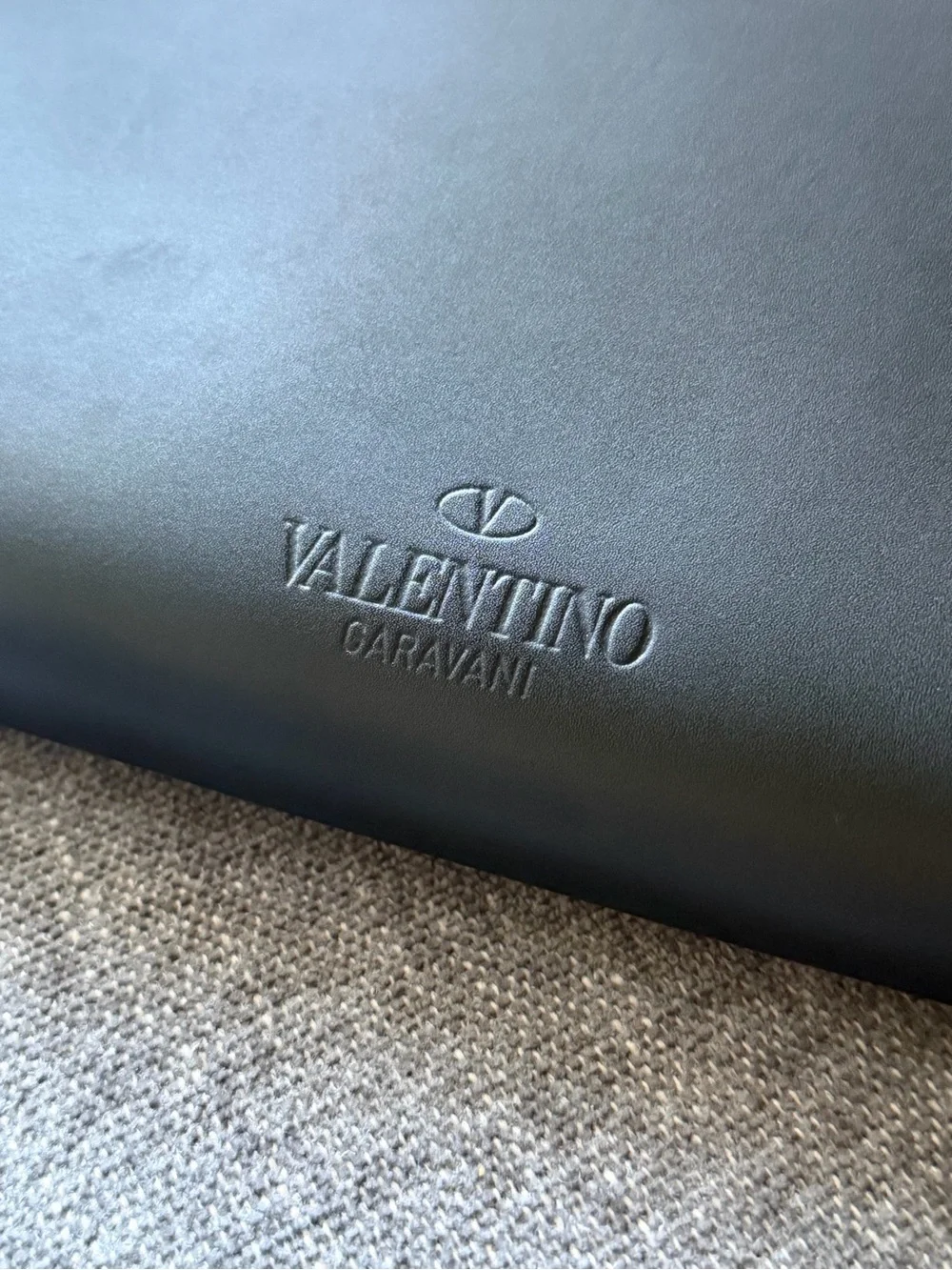 Valentino Garavani VLTN Black Leather Zip Pouch with Stud Accents